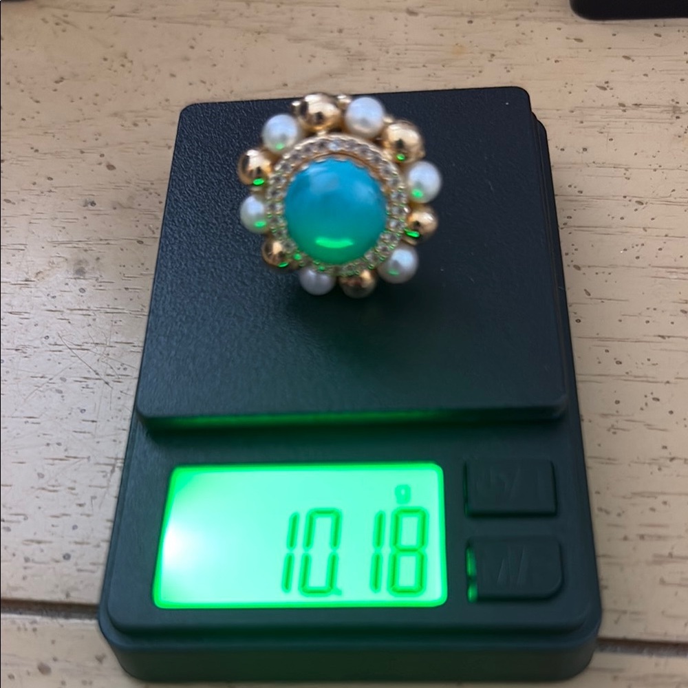 Ladies pearl, torquoise and white sapphire ring. Either 10k or 14k.